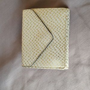 Authentic Aimee Kestenberg  Zip It Up Trifold Wallet made of Genuine Leather.